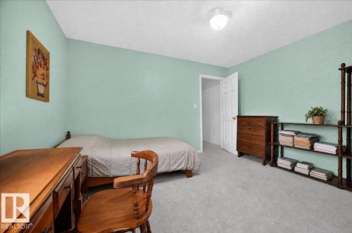Light-colored wall paint, white ceiling with flush-mount lighting, and light-colored carpeting - 121 51205 Range Road 195, Rural Beaver County, AB - Indoor Photo Showing Bedroom