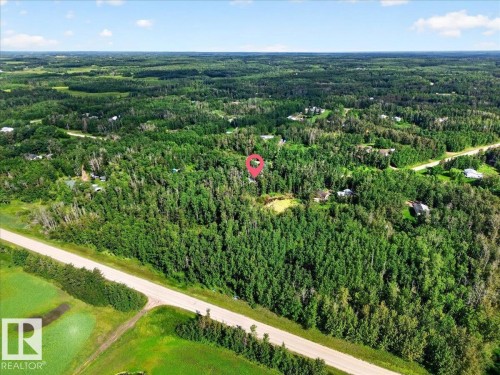 Expansive wooded property featuring a natural pond and surrounding green landscape - 121 51205 Range Road 195, Rural Beaver County, AB - Outdoor With View