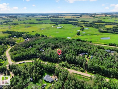 Expansive property featuring a treed landscape, multiple bodies of water, and surrounding open fields - 121 51205 Range Road 195, Rural Beaver County, AB - Outdoor With View