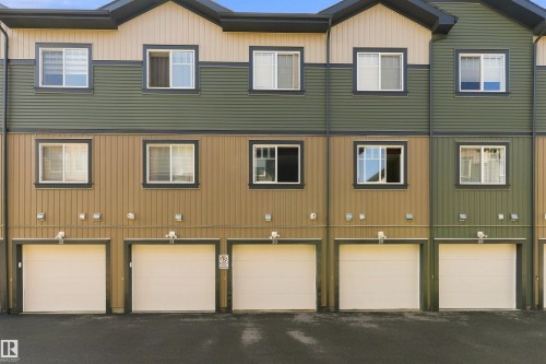 Multi-toned exterior siding with a combination of horizontal and vertical panels - #30 3305 Orchards Link Sw Sw, Edmonton, AB 