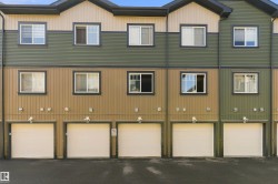 Multi-toned exterior siding with a combination of horizontal and vertical panels - 