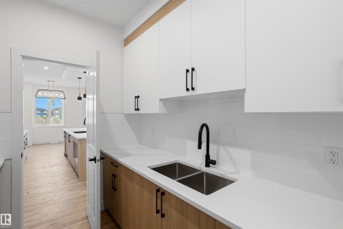 1786 Crossbill Loop Nw, Edmonton, AB - Indoor Photo Showing Kitchen With Double Sink