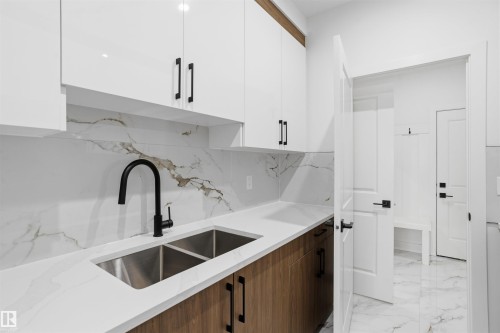 803 158 Avenue Ne, Edmonton, AB - Indoor Photo Showing Kitchen With Double Sink