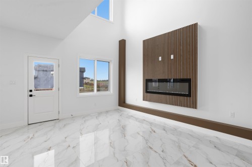 803 158 Avenue Ne, Edmonton, AB - Indoor With Fireplace