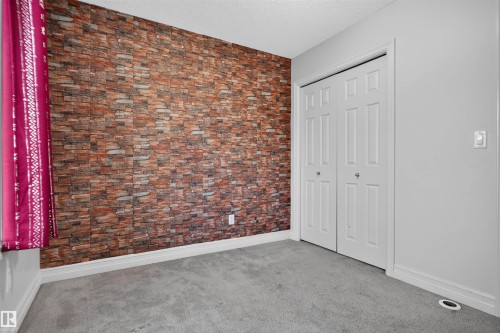 #69 3625 144 Av Nw, Edmonton, AB - Indoor Photo Showing Other Room