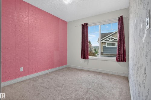 #69 3625 144 Av Nw, Edmonton, AB - Indoor Photo Showing Other Room