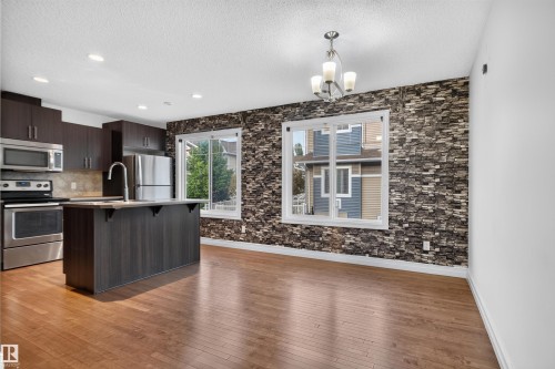 #69 3625 144 Av Nw, Edmonton, AB - Indoor Photo Showing Kitchen With Upgraded Kitchen