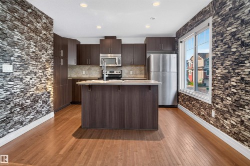 #69 3625 144 Av Nw, Edmonton, AB - Indoor Photo Showing Kitchen With Upgraded Kitchen