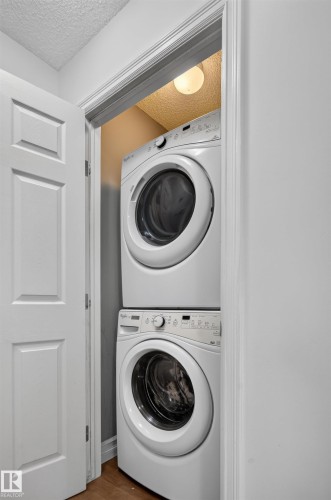 #69 3625 144 Av Nw, Edmonton, AB - Indoor Photo Showing Laundry Room