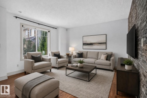 #69 3625 144 Av Nw, Edmonton, AB - Indoor Photo Showing Living Room
