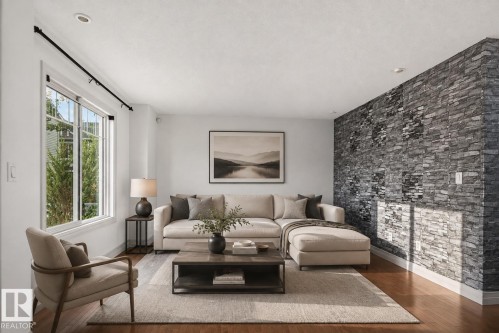 #69 3625 144 Av Nw, Edmonton, AB - Indoor Photo Showing Living Room
