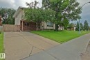 Two-story residence featuring a brick facade and light-toned siding - 18107 89 Avenue Nw, Edmonton, AB  - Outdoor 