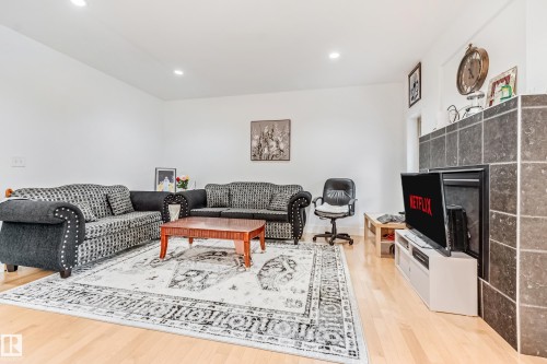 1508 68 Street Sw, Edmonton, AB - Indoor Photo Showing Living Room With Fireplace