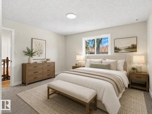 Wall-to-wall carpeting with a neutral color palette - #21 9375 172 St Nw, Edmonton, AB - Indoor Photo Showing Bedroom
