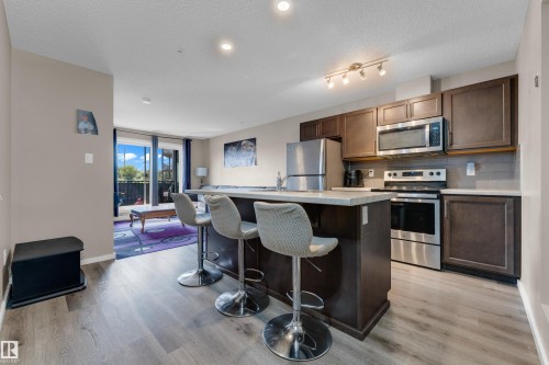 #227 148 Ebbers Bv Nw, Edmonton, AB - Indoor Photo Showing Kitchen With Stainless Steel Kitchen
