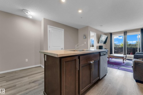#227 148 Ebbers Bv Nw, Edmonton, AB - Indoor Photo Showing Kitchen With Double Sink