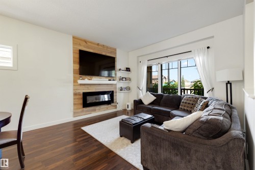 171 Hawks Ridge Boulevard Nw, Edmonton, AB - Indoor Photo Showing Living Room With Fireplace