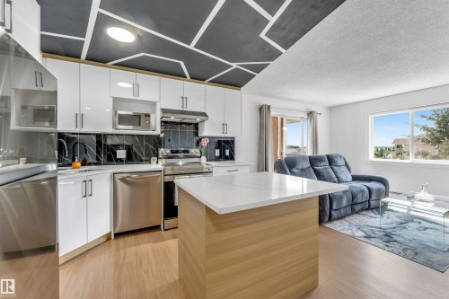 #416 2305 35A Av Nw, Edmonton, AB - Indoor Photo Showing Kitchen With Stainless Steel Kitchen