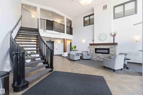 #104 10221 111 St Nw, Edmonton, AB - Indoor With Fireplace