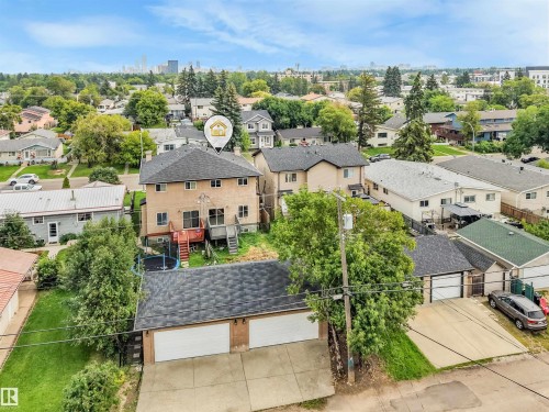 Two-story residence with a multi-level deck and a detached two-car garage - 10234 155 Street Nw, Edmonton, AB - Outdoor