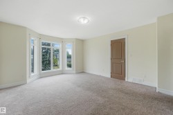 Bay window with multiple panels and white trim - 