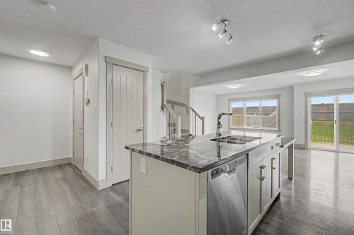 7307 Armour Crescent Sw, Edmonton, AB - Indoor Photo Showing Kitchen With Double Sink With Upgraded Kitchen