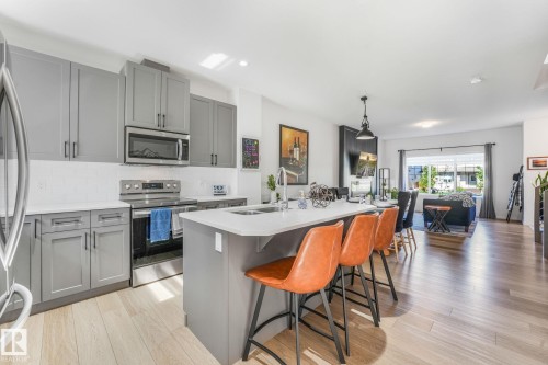 4417 38 Street, Beaumont, AB - Indoor Photo Showing Kitchen With Stainless Steel Kitchen With Double Sink With Upgraded Kitchen