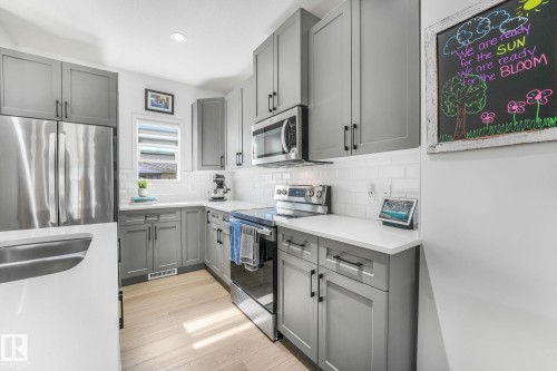 4417 38 Street, Beaumont, AB - Indoor Photo Showing Kitchen With Stainless Steel Kitchen With Double Sink With Upgraded Kitchen
