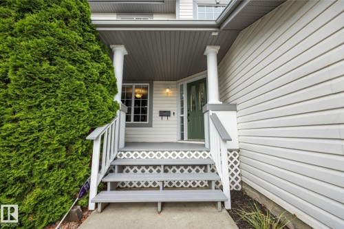 Covered entry with decorative columns - 15 Orchid Place, St. Albert, AB - Outdoor With Exterior