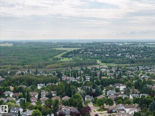 Expansive tree-lined community with residential properties and abundant green space - 15 Orchid Place, St. Albert, AB - Outdoor With View