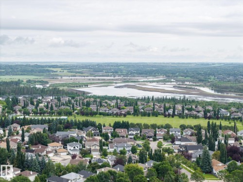 Expansive community setting with varied rooflines and extensive tree coverage - 15 Orchid Place, St. Albert, AB - Outdoor With View