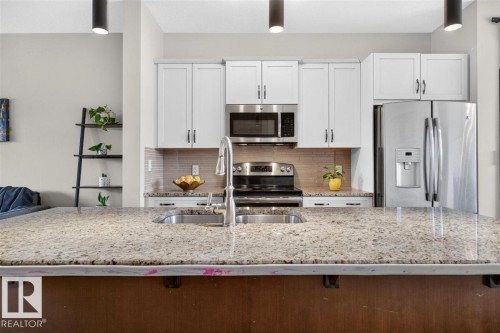 3150 Carpenter Landing Sw, Edmonton, AB - Indoor Photo Showing Kitchen With Stainless Steel Kitchen With Double Sink With Upgraded Kitchen