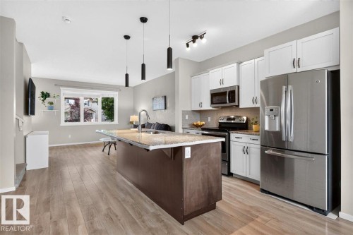 3150 Carpenter Landing Sw, Edmonton, AB - Indoor Photo Showing Kitchen With Stainless Steel Kitchen With Double Sink With Upgraded Kitchen
