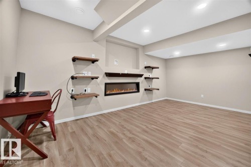 3150 Carpenter Landing Sw, Edmonton, AB - Indoor With Fireplace