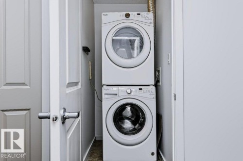 #415 508 Albany Way Nw, Edmonton, AB - Indoor Photo Showing Laundry Room