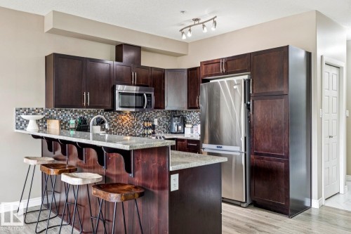 #104 9603 98 Av Nw, Edmonton, AB - Indoor Photo Showing Kitchen With Upgraded Kitchen