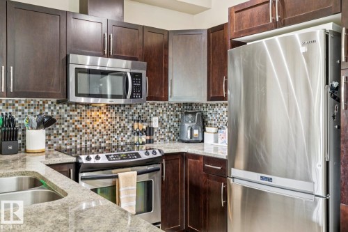 #104 9603 98 Av Nw, Edmonton, AB - Indoor Photo Showing Kitchen With Double Sink With Upgraded Kitchen