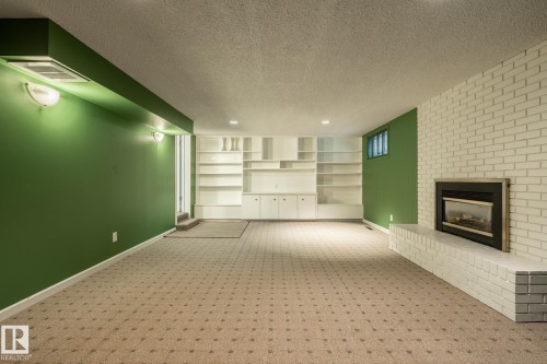 7711 139 Street Nw, Edmonton, AB - Indoor With Fireplace