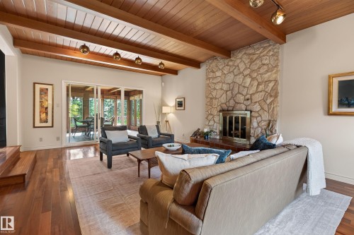 7711 139 Street Nw, Edmonton, AB - Indoor Photo Showing Living Room With Fireplace
