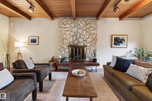 7711 139 Street Nw, Edmonton, AB - Indoor Photo Showing Living Room With Fireplace