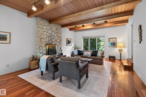 7711 139 Street Nw, Edmonton, AB - Indoor Photo Showing Living Room With Fireplace