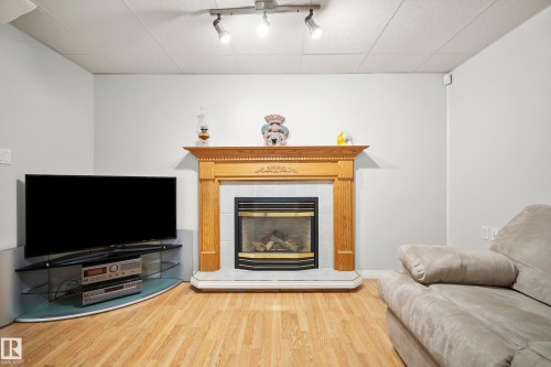 17312 105 Street Nw, Edmonton, AB - Indoor Photo Showing Living Room With Fireplace
