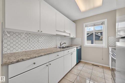 #14 14803 34 St Nw, Edmonton, AB - Indoor Photo Showing Kitchen With Double Sink