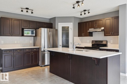 5935 18 Avenue Sw, Edmonton, AB - Indoor Photo Showing Kitchen With Upgraded Kitchen
