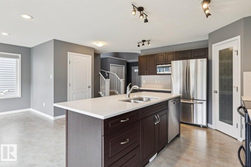 5935 18 Avenue Sw, Edmonton, AB - Indoor Photo Showing Kitchen With Double Sink