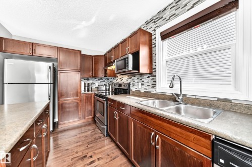 3512 11 Street Nw, Edmonton, AB - Indoor Photo Showing Kitchen With Double Sink