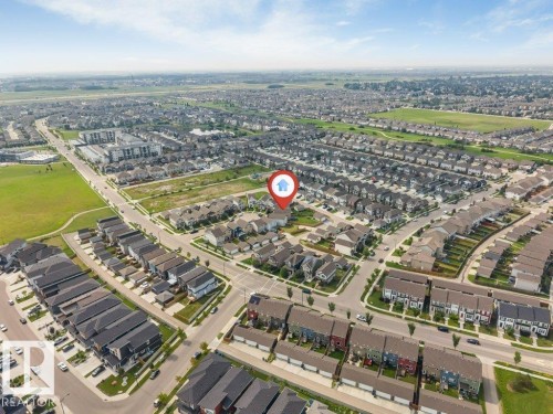 Aerial perspective showcasing a residential neighborhood with varied housing styles - 2436 18 Avenue Nw, Edmonton, AB 