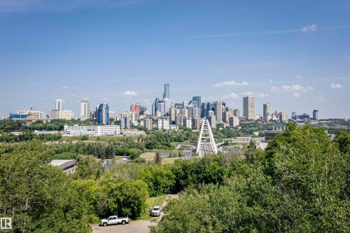 Expansive city skyline featuring various high-rise buildings and architectural styles - #208 9907 91 Av Nw, Edmonton, AB - Outdoor With View