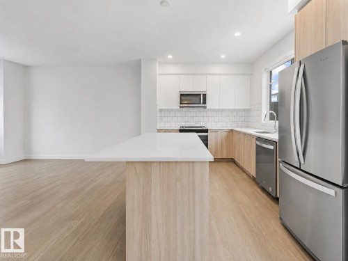 #528 857 Belmont Dr Sw, Calgary, AB - Indoor Photo Showing Kitchen With Stainless Steel Kitchen With Upgraded Kitchen