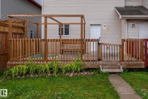 Wood-finish deck with a pergola structure - 1209 30 Avenue Nw, Edmonton, AB - Outdoor With Deck Patio Veranda With Exterior